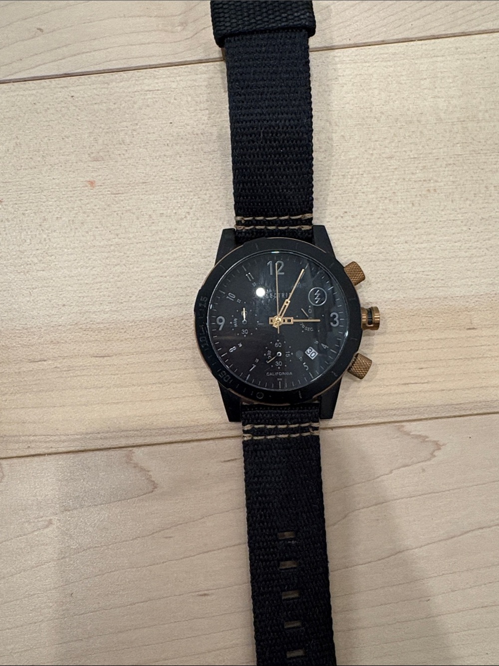 Electric Black Watch with Gold Accents